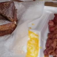 French Toast Breakfast  · Two eggs, sausage or bacon with grits
*NO SUBSTITUTIONS*