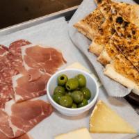 Tagliere · Charcuterie for two with Italian meat, cheese, and olives. Served with a side of focaccia.