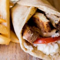 Chicken Wrap · Grilled chicken, grilled tomato and onion wrap in pita bread. Side fries.