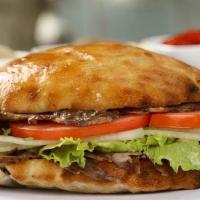 Gyro Sandwich  · Turkish style gyro, lettuce, tomato & onion side fries & Tzatziki sauce.100% meat!