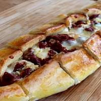 Pastirma Pide · Our cheese pide topped with dried beef (Pastirma).