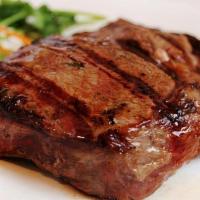 New York Steak · INCLUDES GREEN SALAD AND ONE OTHER SIDE ITEM OF YOUR CHOICE