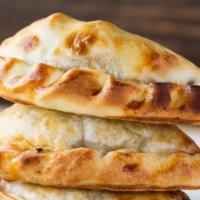 Empanadas · Chicken, meat, ham & cheese, onions & cheese, caprese, spinach, cut knife meat, mushrooms wi...