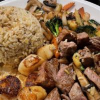 Ny Strip And Scallop Hibachi Dinner · Served with miso soup or house salad with ginger dressing, steamed rice, shrimp appetizer an...