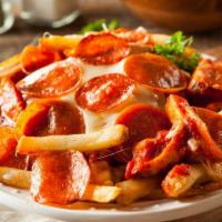 Pizza Fries · Crispy, craveable French fries covered pizza sauce and mozzarella.