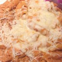 Baked Zitti · Zitti in a pomodoro sauce with ricotta cheese, ground beef, topped with mozzarella cheese an...