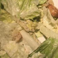 Tuscany Caesar Salad · Romaine lettuce, croutons, Parmesan cheese, Caesar dressing.