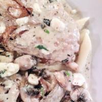 Veal Gorgonzola · Seared veal scallopini, wild mushrooms, gorgonzola cream, spaghetti.
