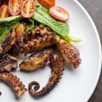 Grilled Octopus · Baby octopus, cherry tomatoes, garlic, finished in the brick oven.
