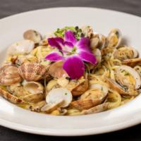 Linguine Alle Vongole · White or red, baby clams sautéed in a wine sauce.