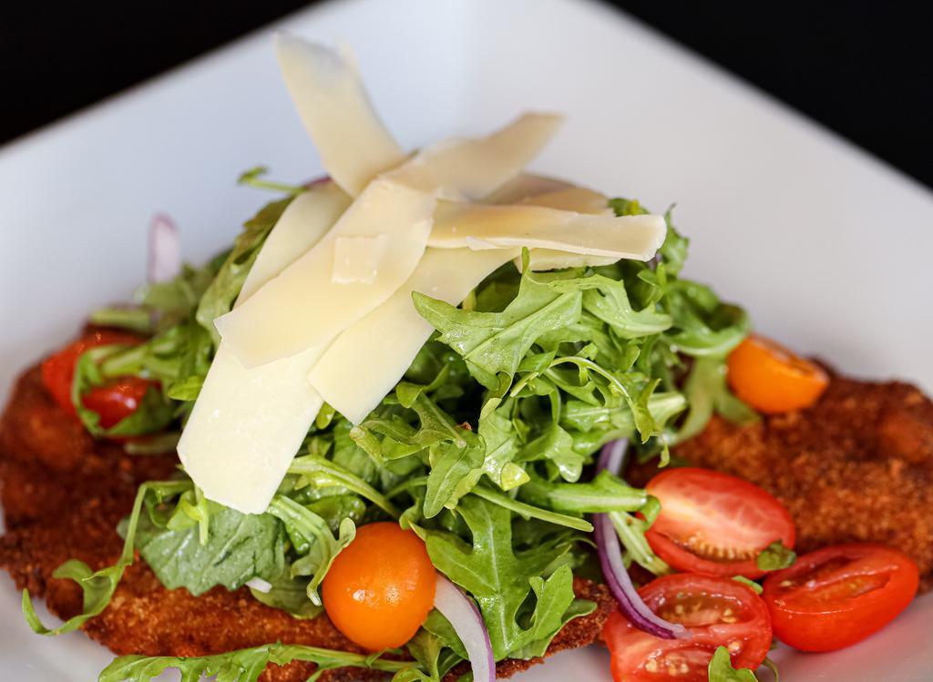 Alla Milanese (Fried)  · Topped with tomatoes, arugula, shaved Parmigiano.