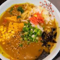 Curry Chicken Udon · Curry Beef Broth, Udon, Chicken Chasu, Green Onion, Corn, Kikurage, Cabbage, Fried Tofu, Red...