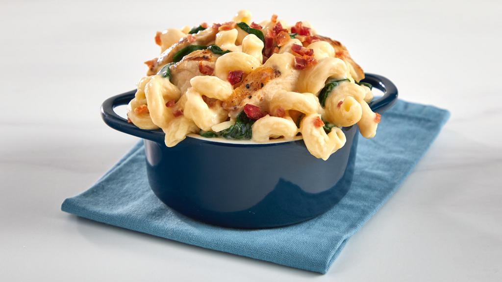 Chicken Florentine Mac & Cheese · A taste of Italy in our homemade Mac & Cheese tossed with chicken breast grilled to perfection, fresh baby spinach, mozarella cheese, and crisp applewood smoked bacon.
