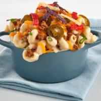 Southwestern Mac & Cheese (Jalapenos & Tortilla Side) · A taste of Mexico in our homemade Mac & Cheese tossed with shaved Ribeye beef and Cheddar Ch...