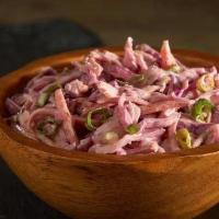 Spicy Coleslaw Salad · Freshly shaved cabbage, carrots, and chives in our homemade Cayenne pepper spicy mayonnaise ...