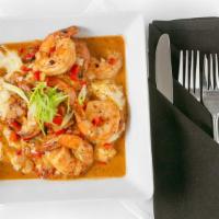 Shrimp & Grits · Cheesy Grits Served with Our Blackened Shrimp, Sautee Onions and peppers. and with Two Eggs ...