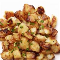 Home Fries · Fresh Cut to order fried potato perfectly seasoned.