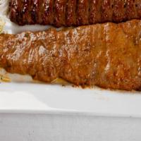 Soltani Kabob · Combination of ground beef koobideh kabob, and beef filet mignon kabob. Served with fresh sa...