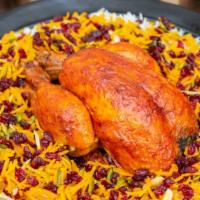 Zereshk Polo With Chicken · Chicken with rice and dried barberry.