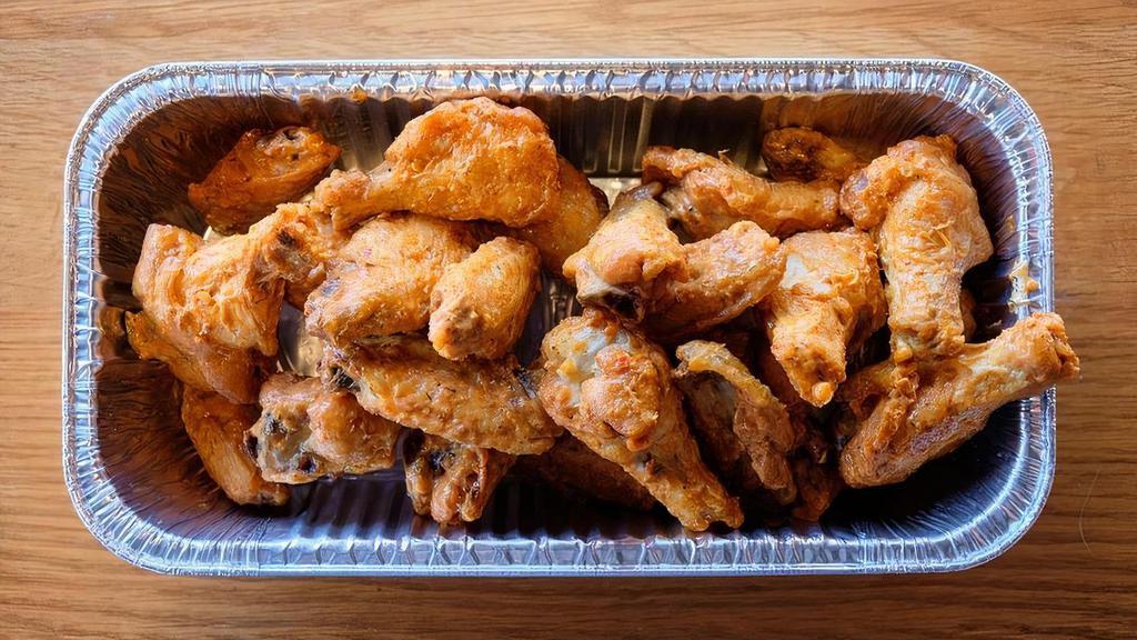 30 Wings (3 Flavors) · 30 (Bone-In) wings with 3 flavors. (Dips not included)