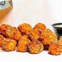 Fam Pack · Served 4-5. 32 pieces of oven-baked crispy chicken bites seasoned with your choice of dust a...