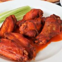 Chicken Wings · Mild, Hot, Garlic or BBQ with Blue Cheese.