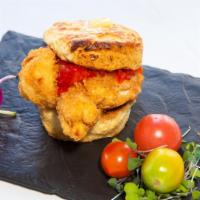Chicken Biscuit · Hand made daily/hand breaded jumbo chicken tenders/red pepper jelly.