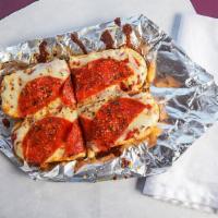 Dave'S Pizza Sub · Pepperoni or plain, covered with Dave's cosmic marinara sauce, olive oil, sprinkled with fre...