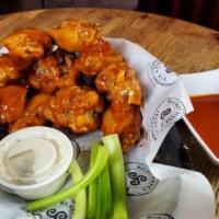 Míckey'S Wings · Ten jumbo wings with bleu cheese dressing, celery and your choice of sauce.