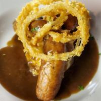 Bangers 'N' Mash · Three Irish style bangers with creamy mash. Topped with a savory gravy and haystack onions.