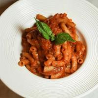 Pomodoro E Parmigiano Pasta · sicilian cherry toamato sauce, italian basil pesto, garlic, parmigiano reggiano DOP, basil, ...