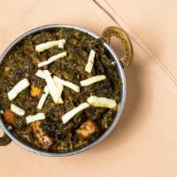 Sag Paneer · Cheese cooked in spinach and flavorful spices. Served with rice, mint and onion chutneys.
