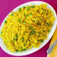 Rice Pullao · Lightly fried rice with peas and a touch of cumin seeds.