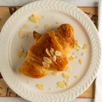Le Almond Croissant · Vegetarian. Just like if you were in any bakery in Paris, croissant stuffed with almond past...
