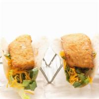 Fish Tacos · Two tacos with your choice of fish topped with lettuce, cheese and your choice of sauce