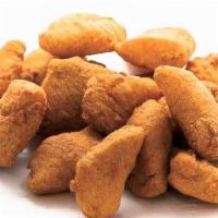 Kids Chicken Nuggets · A kids sized portion of chicken nuggets, choice of fries or Mac 'N Cheese and a small drink.