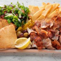 Gyro Chicken Platter · Served with Greek salad, pita bread, side of tzatziki, Greek dressing and your choice of bas...