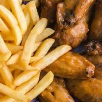 Buffalo Wings W French Fries · Take flight with eight hot or mild jumbo buffalo wings, served with french fries, celery, an...