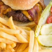 Bacon Burger · Lettuce and tomatoes on a toasted bun with French Fries pickle.