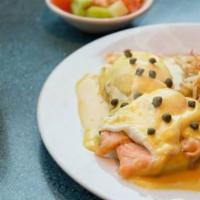 Eggs Benedict · Two Poached eggs with Canadian Bacon served over an English Muffin and Topped with Hollandal...