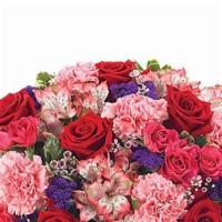 Ever-Budding Romance · Love is in full bloom as red roses, lavender waxflower, pink and white alstroemeria, hot pin...