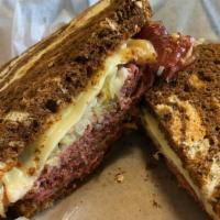 Pee-Wee Herman · The Other Reuben! Pastrami, kraut, Swiss cheese & thousand island on toasted marble rye.