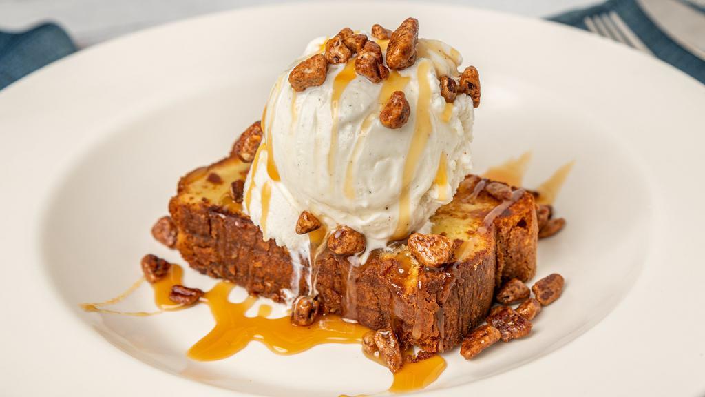 Georgia Peach Pound Cake · Griddled in butter with scoop of vanilla bean ice cream, Bourbon caramel sauce & spiced pecans.