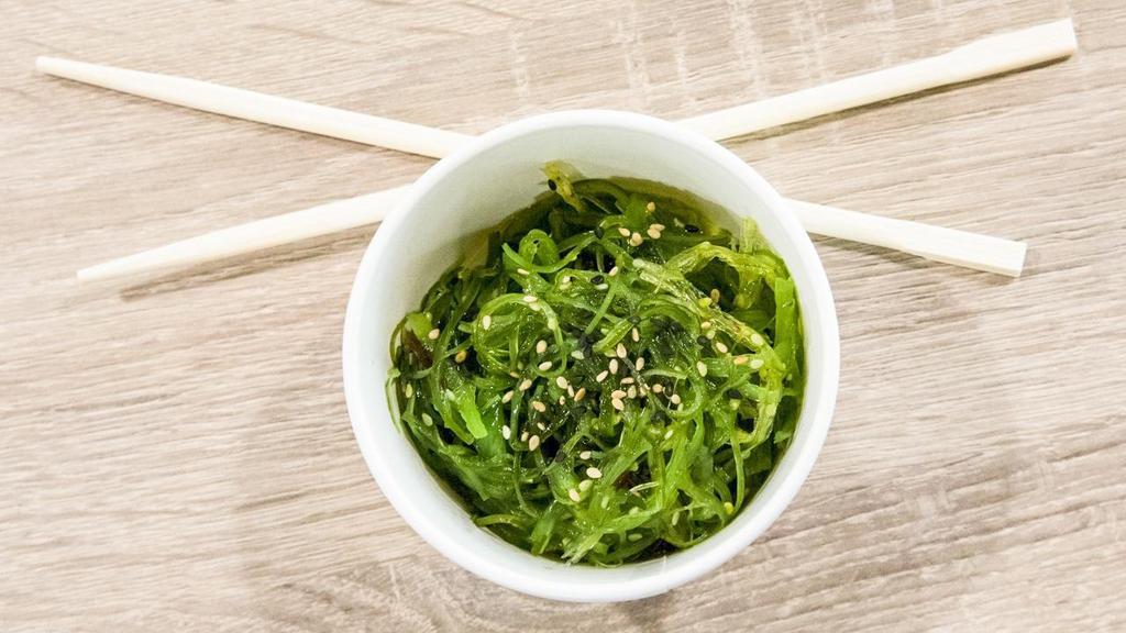Seaweed Salad · Seaweed tossed in lightly sesame and soy sauce, bringing a perfect balance of saltiness and sweetness. Topped with sesame seeds for added texture and a slight nuttiness.