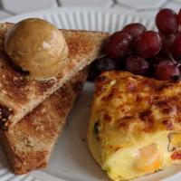 Vegetable Frittata · Crustless quiche, daily mixed vegetables cheese, toast, fruit.  (vegetarian)