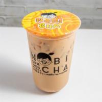 Coffee Milk Tea · Signature Taiwan Tea mixed with creamer and frothy milk. Aromatic and flavorful with a touch...