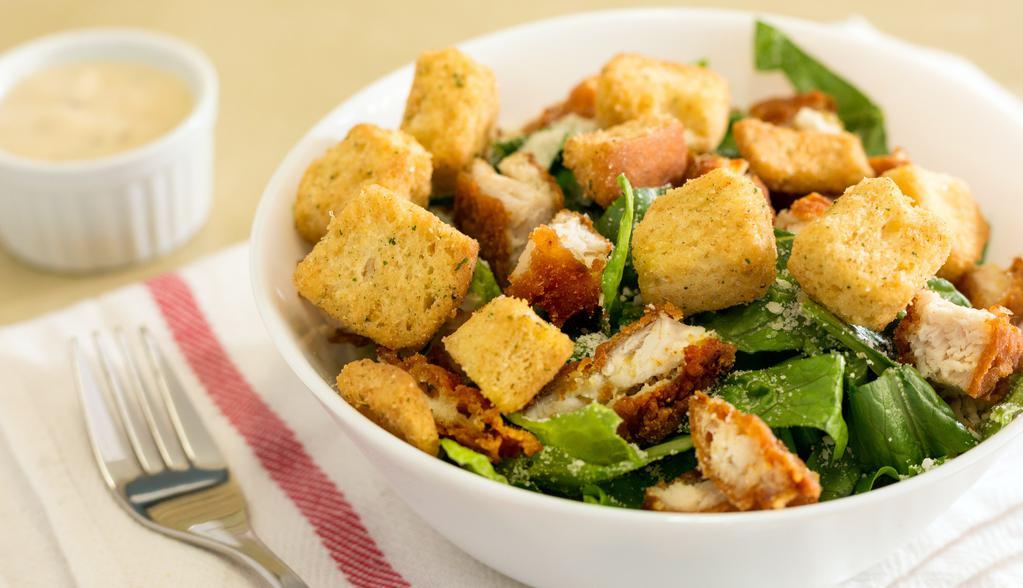 Chicken Caesar Salad · Famous caesar topped with boneless chicken tenders.