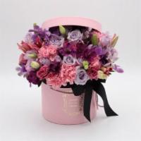 Pink Dreams · This is a unique mixed bouquet of purple roses, pink carnations, orchids, alstroemeria and l...