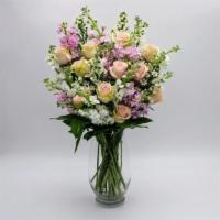 Sweet Peach Bouquet · Twelve peach roses in a crystal vase with white and lavender stock flowers to express sincer...
