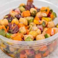 Chickpea Salad · chickpeas, mixed bell peppers, red onion, cilantro, carrot, dried cranberries, cucumber, lem...